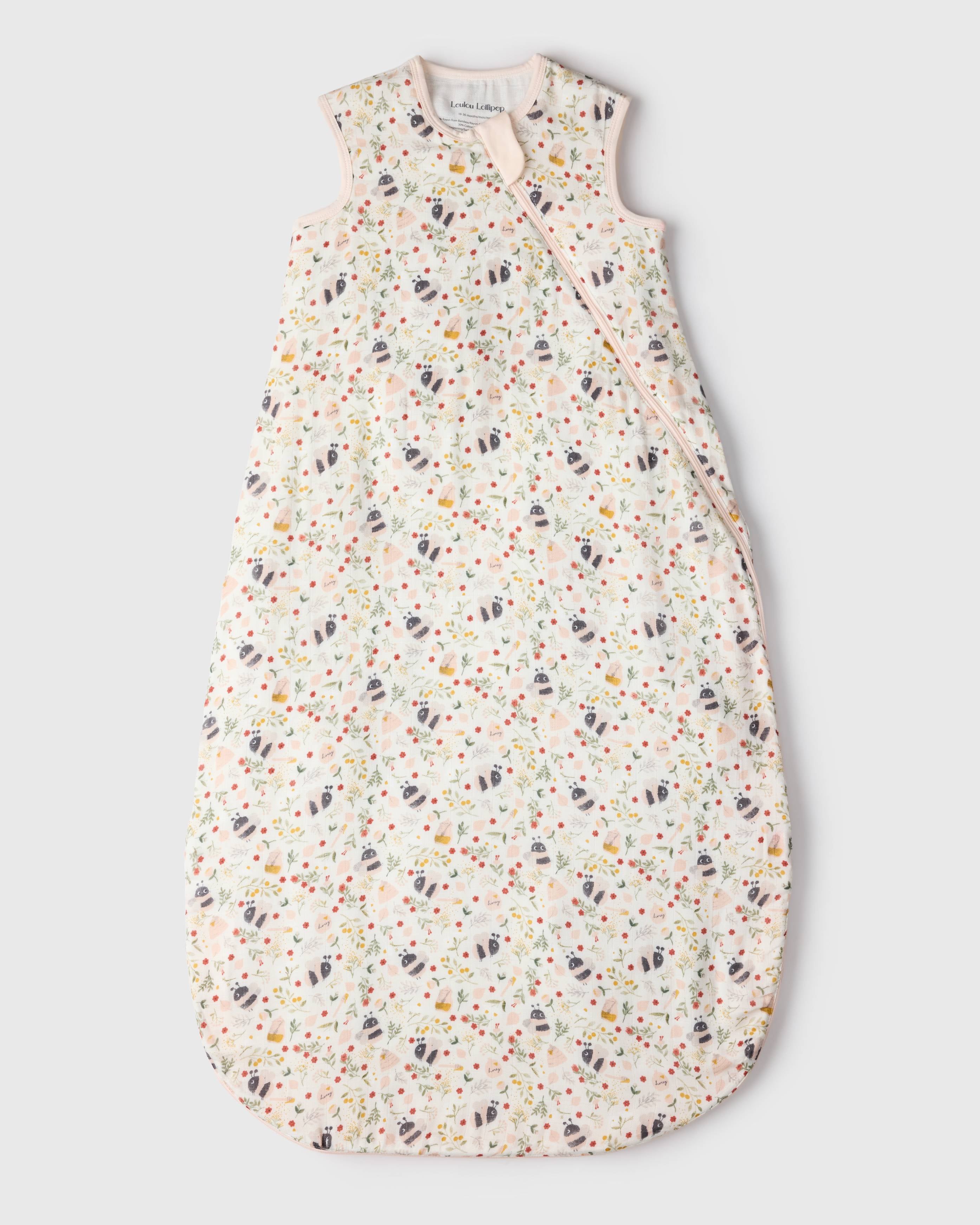 Loulou Lollipop muslin 0.5 TOG lightweight baby sleep bag in Bumble Bees — front view on white background