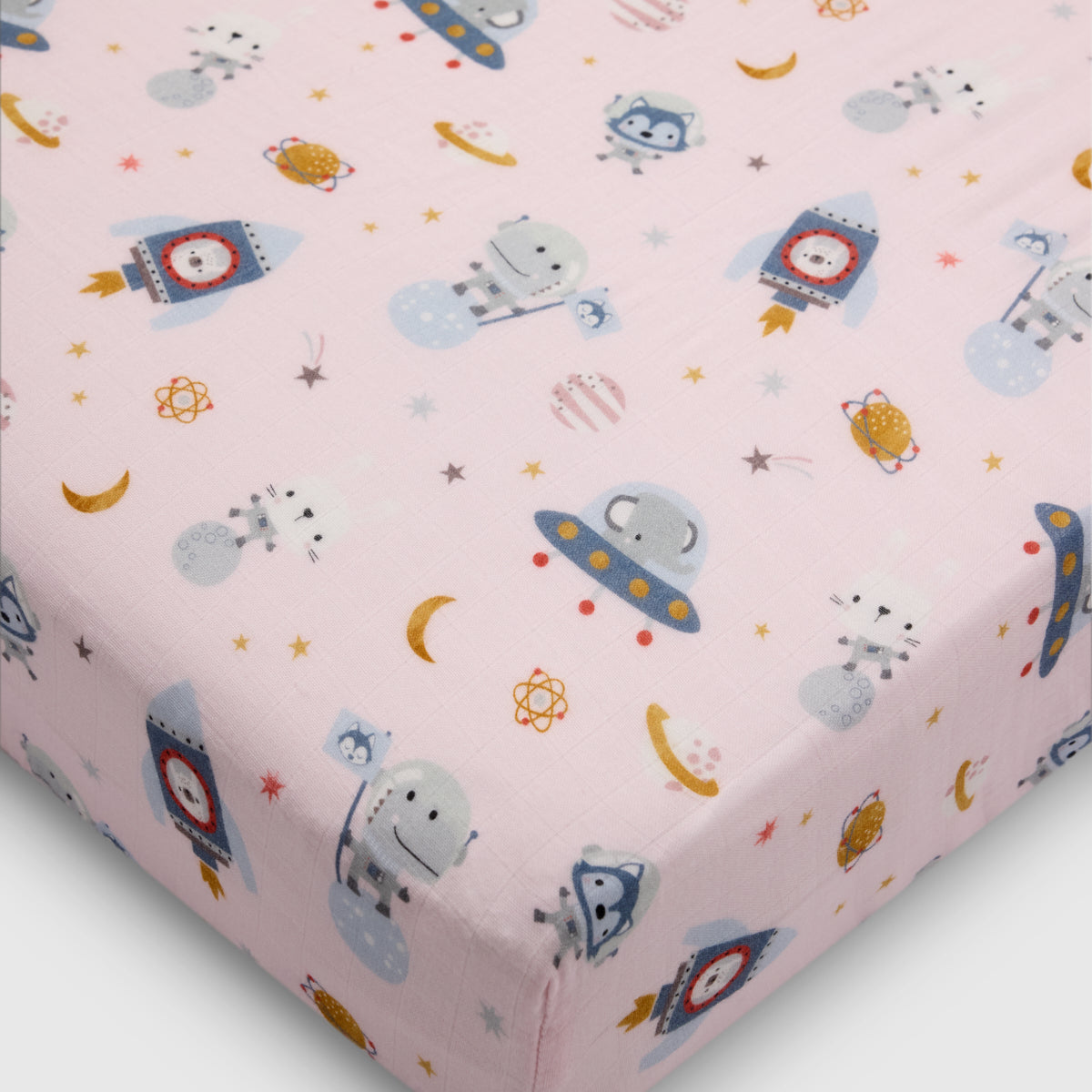 Loulou Lollipop muslin fitted crib sheet in Astro Explorers for US standard crib — front view on white background