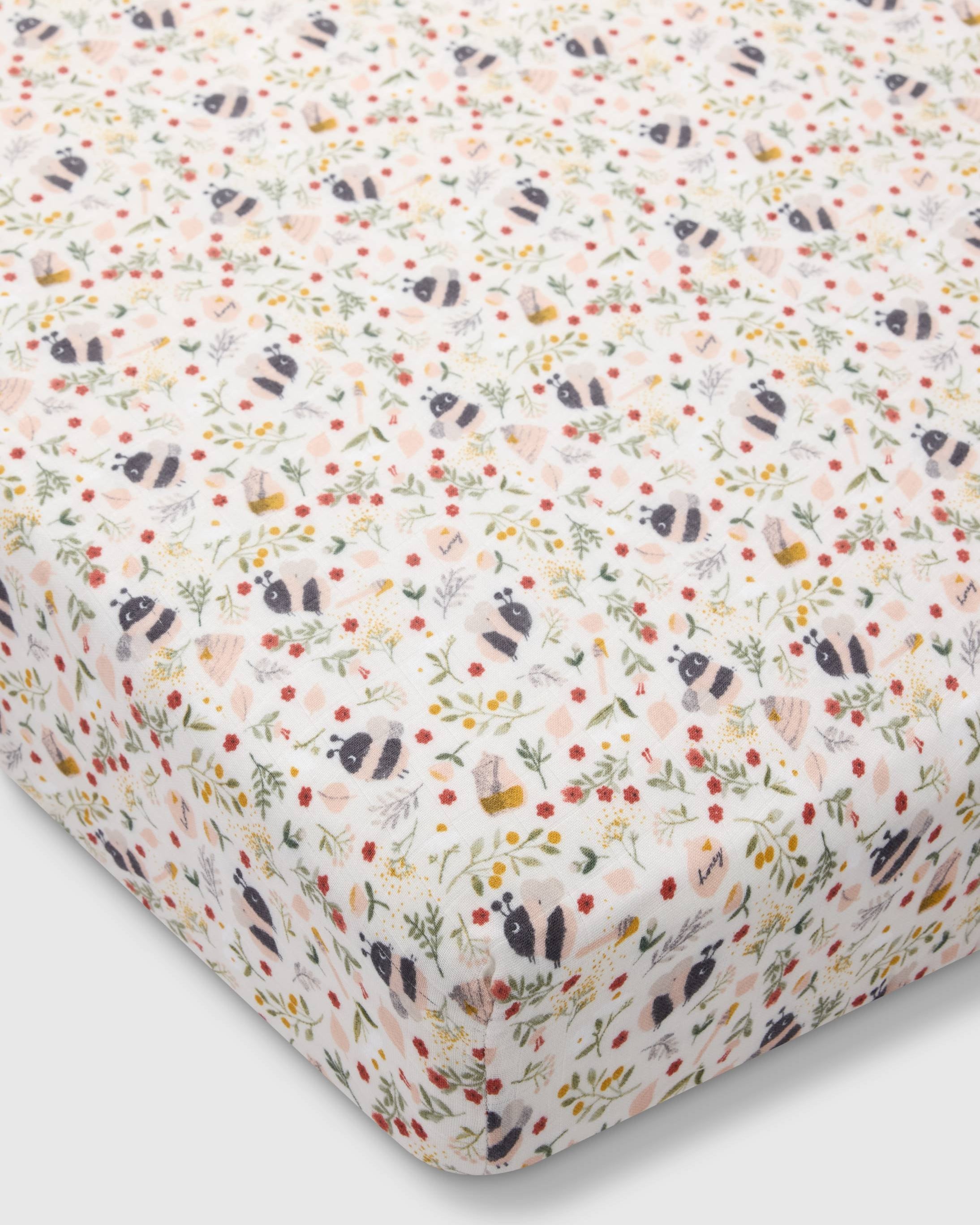 Loulou Lollipop muslin fitted crib sheet in Bumble Bees for US standard crib — front view on white background