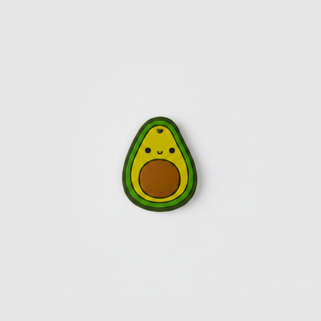 Wooden pacifier clip with avocado, taco, and cheese slice designs on a white background