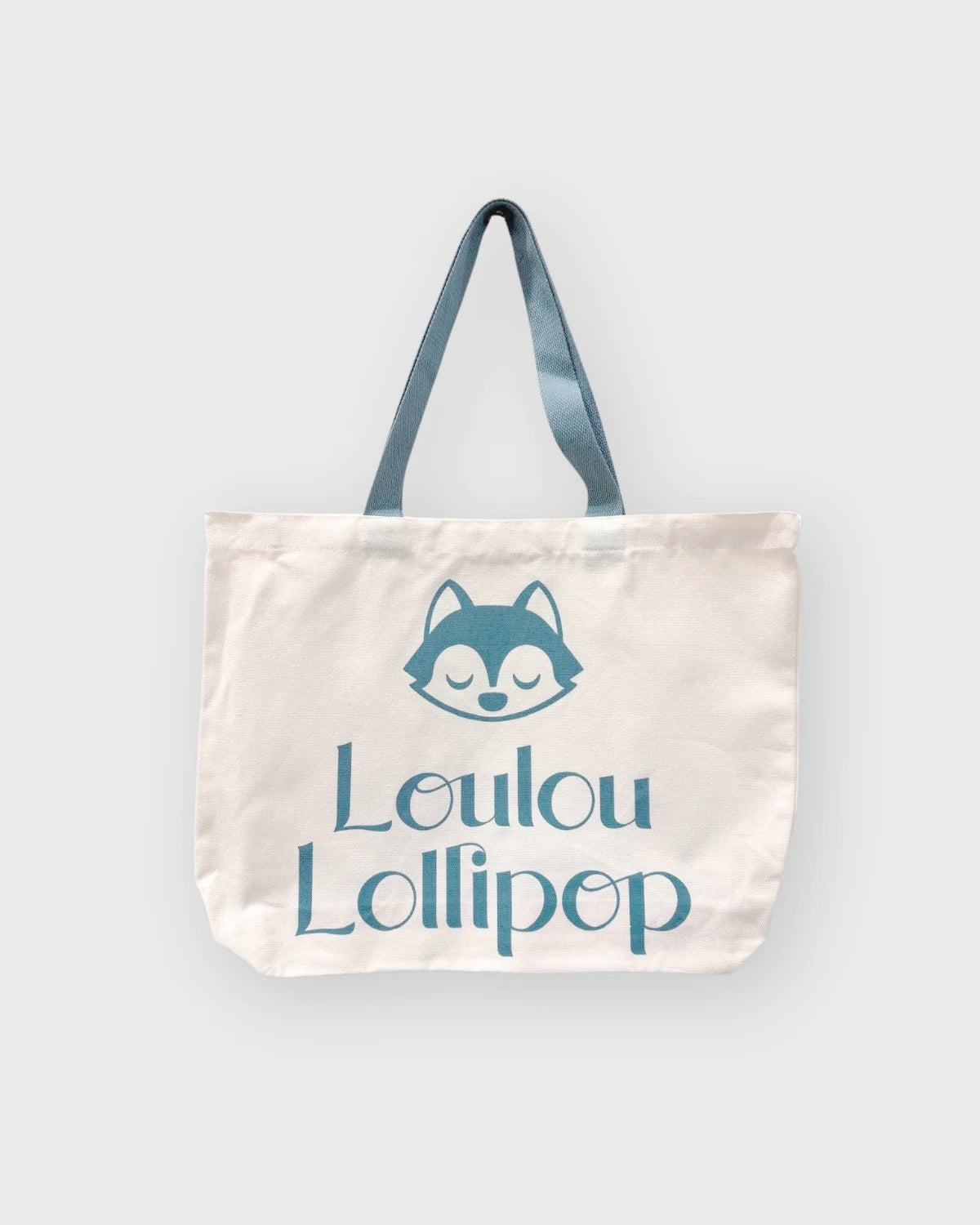 Loulou Lollipop Wolfie Logo Canvas Tote in Wolfie Logo Canvas Tote — front view on white background