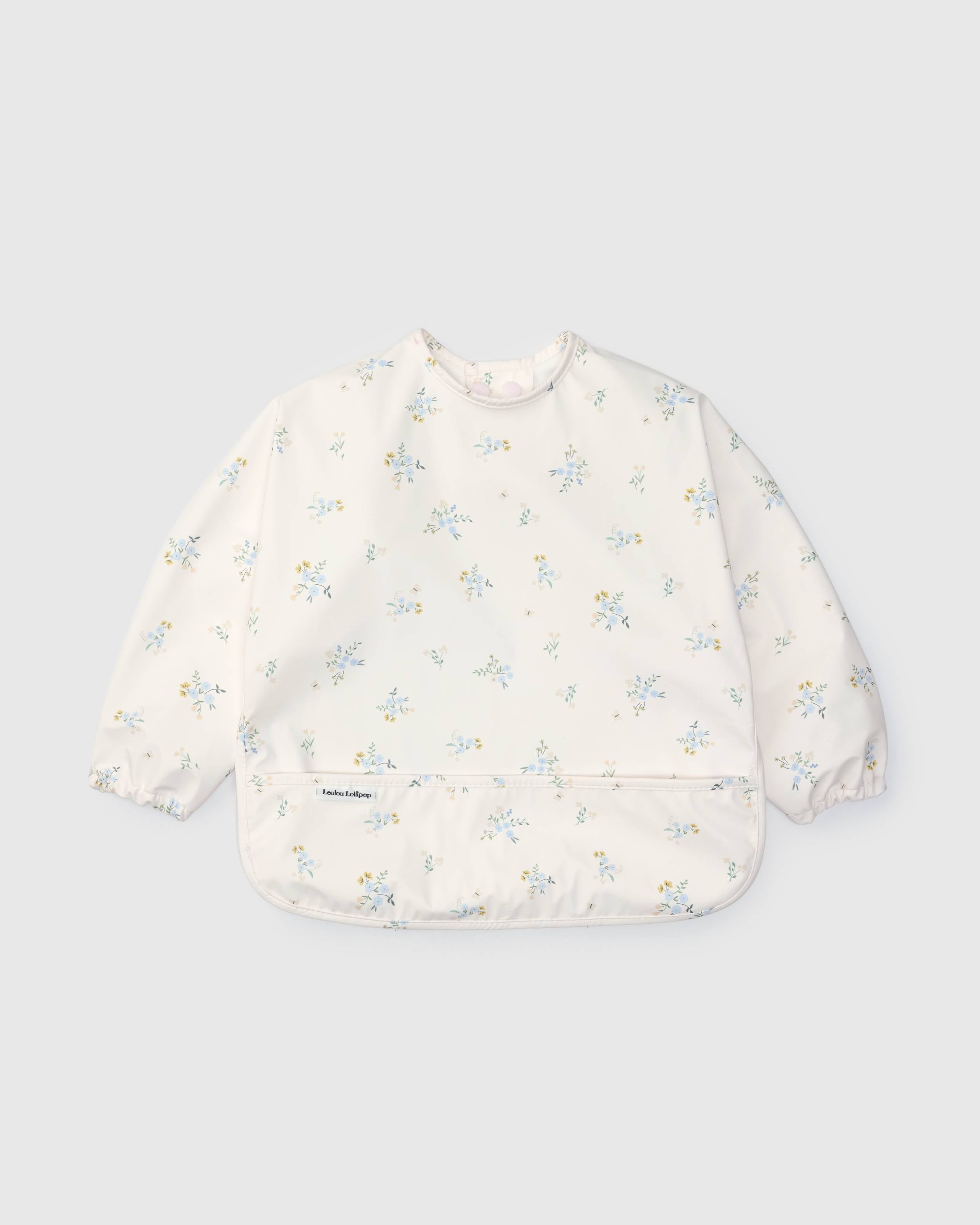 Loulou Lollipop Long Sleeve Bib in Ditsy Floral — front view on white background