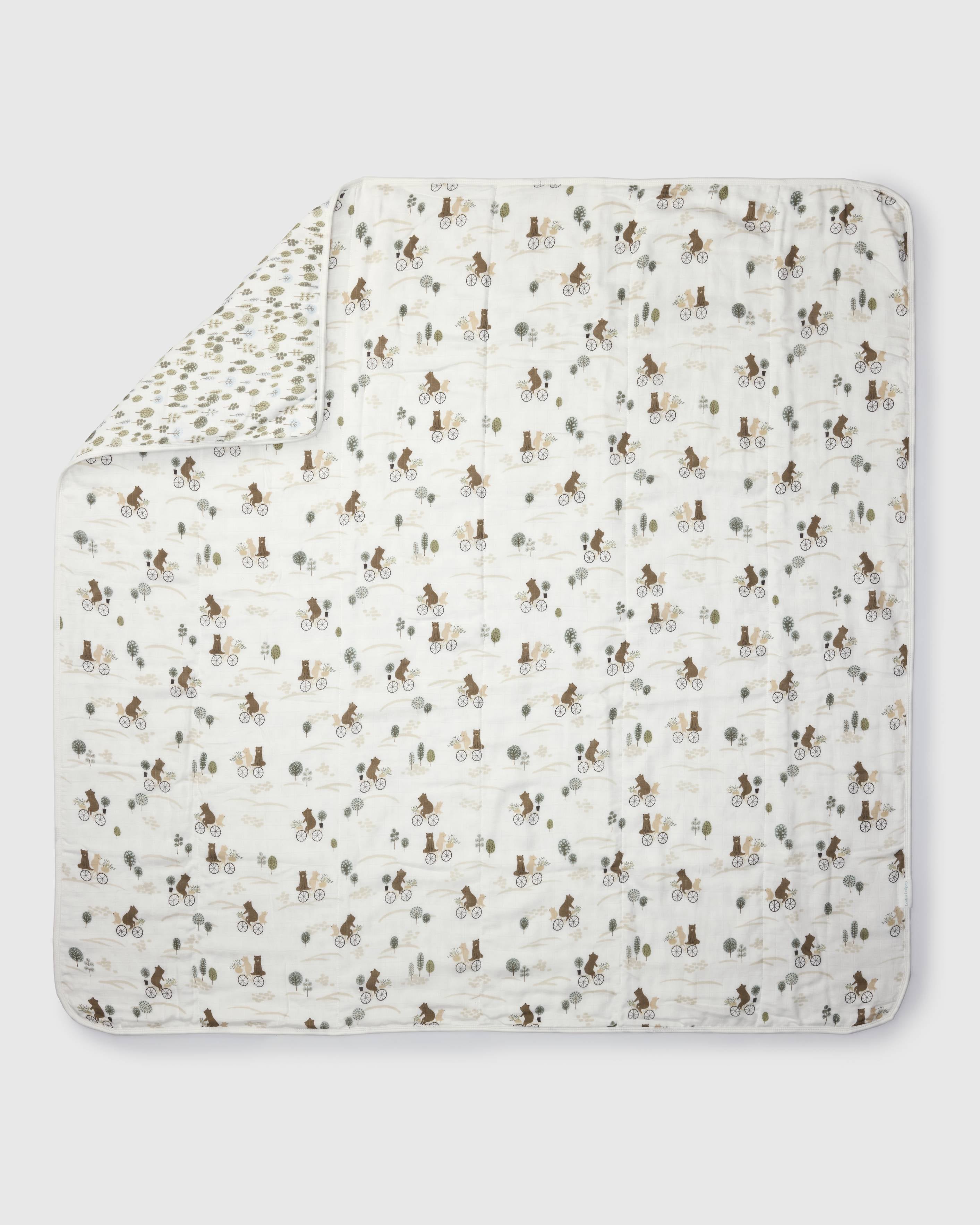 Loulou Lollipop muslin baby quilt blanket in Bears on Bikes — front view on white background