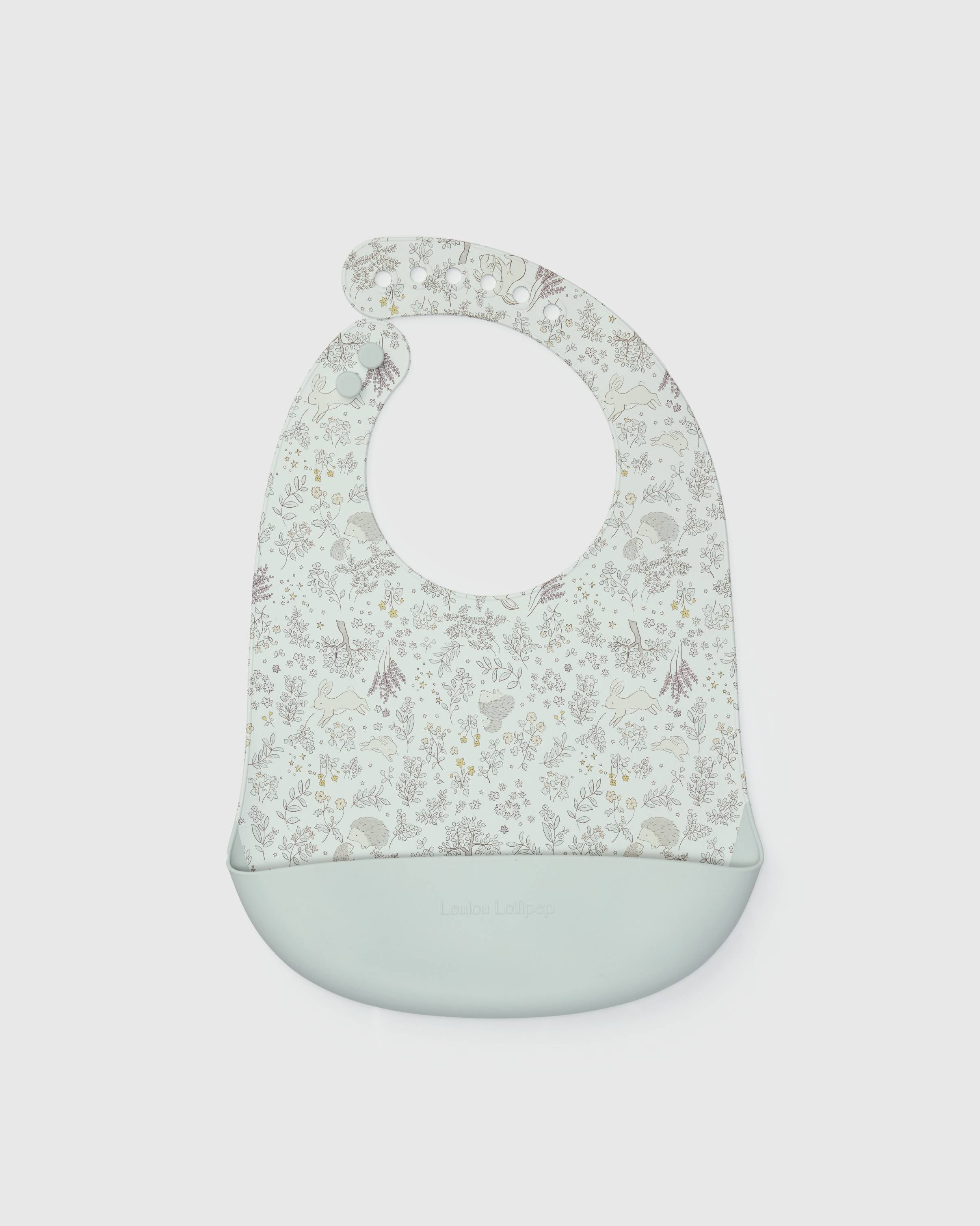 Loulou Lollipop FDA-compliant food-grade silicone baby bib in Hedgehog Forest — front view on white background