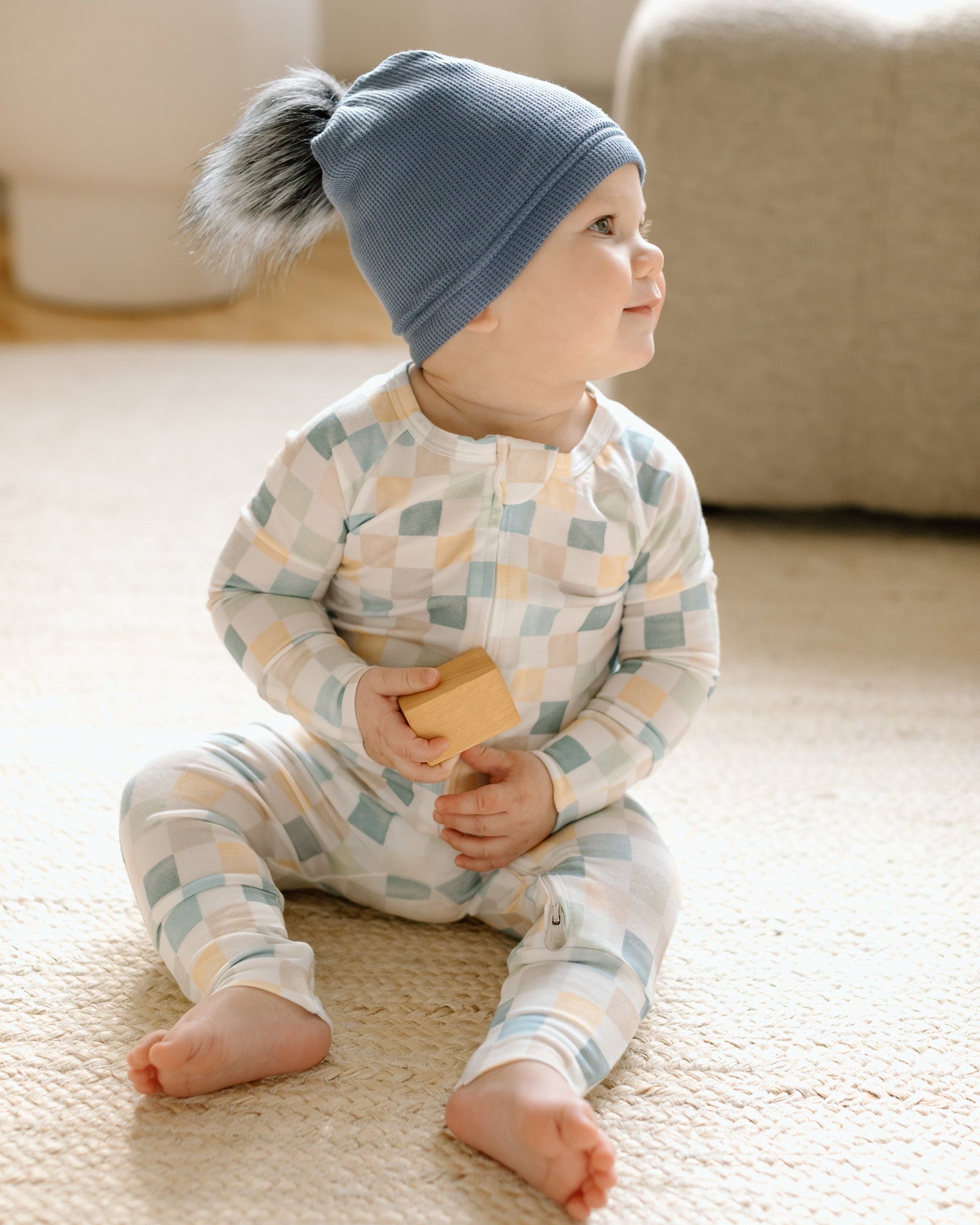 Loulou Lollipop Waffle Pom Pom Hat in Denim Blue — front view on white background