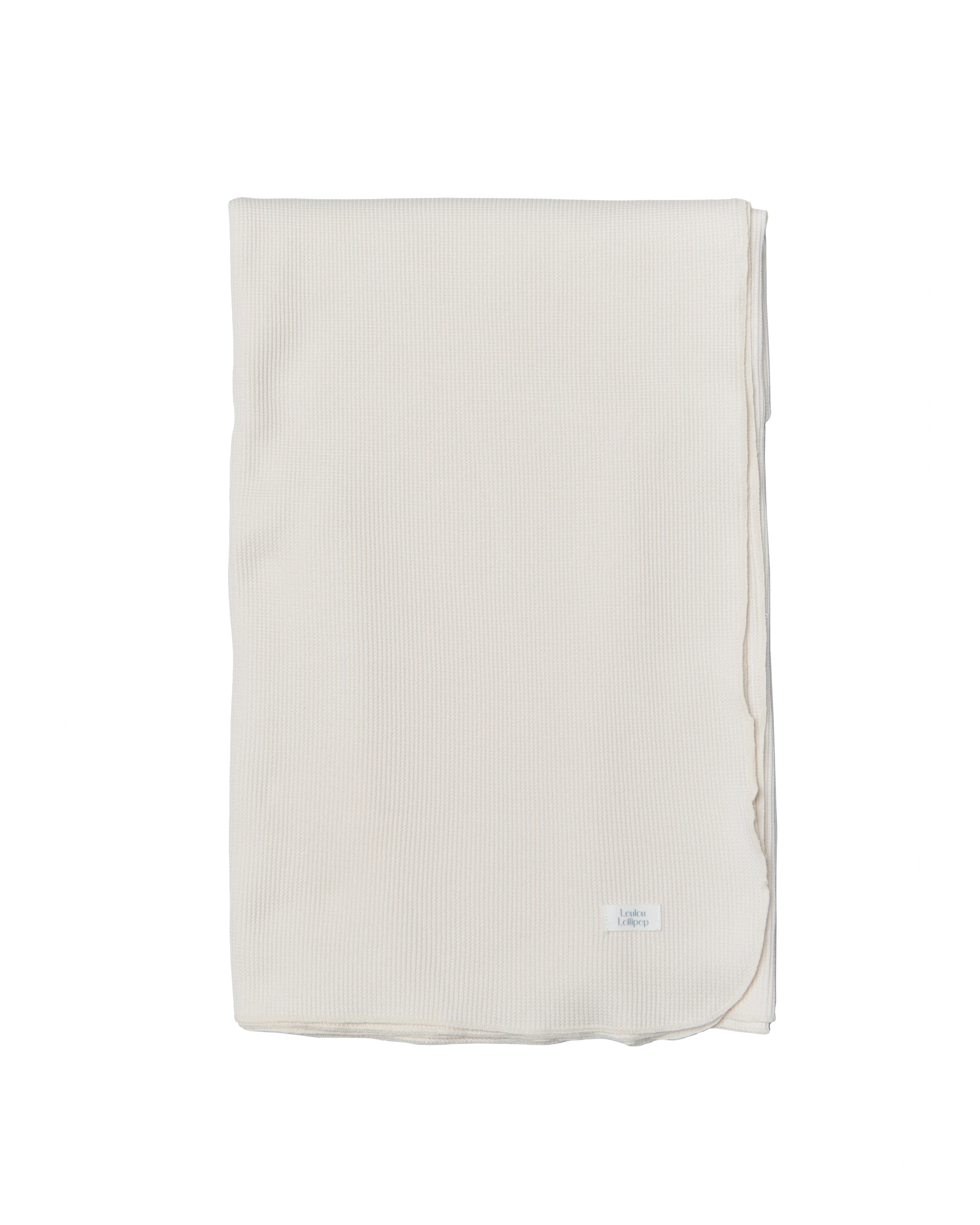 Couverture gaufrée en tricot extensible - lait de coco-1