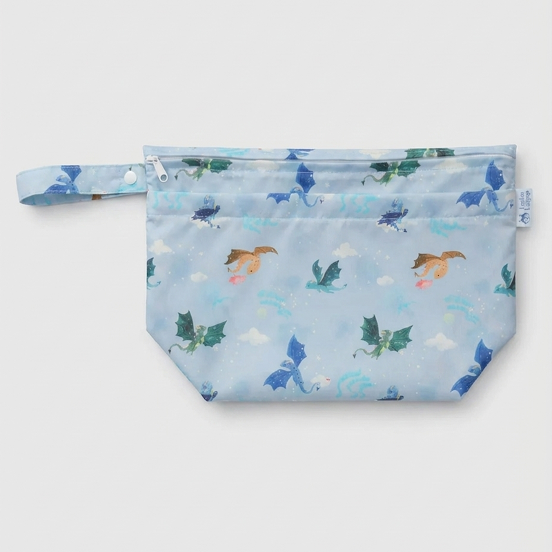 Loulou Lollipop Wet Dry Bag in Magical Dragons — front view on white background