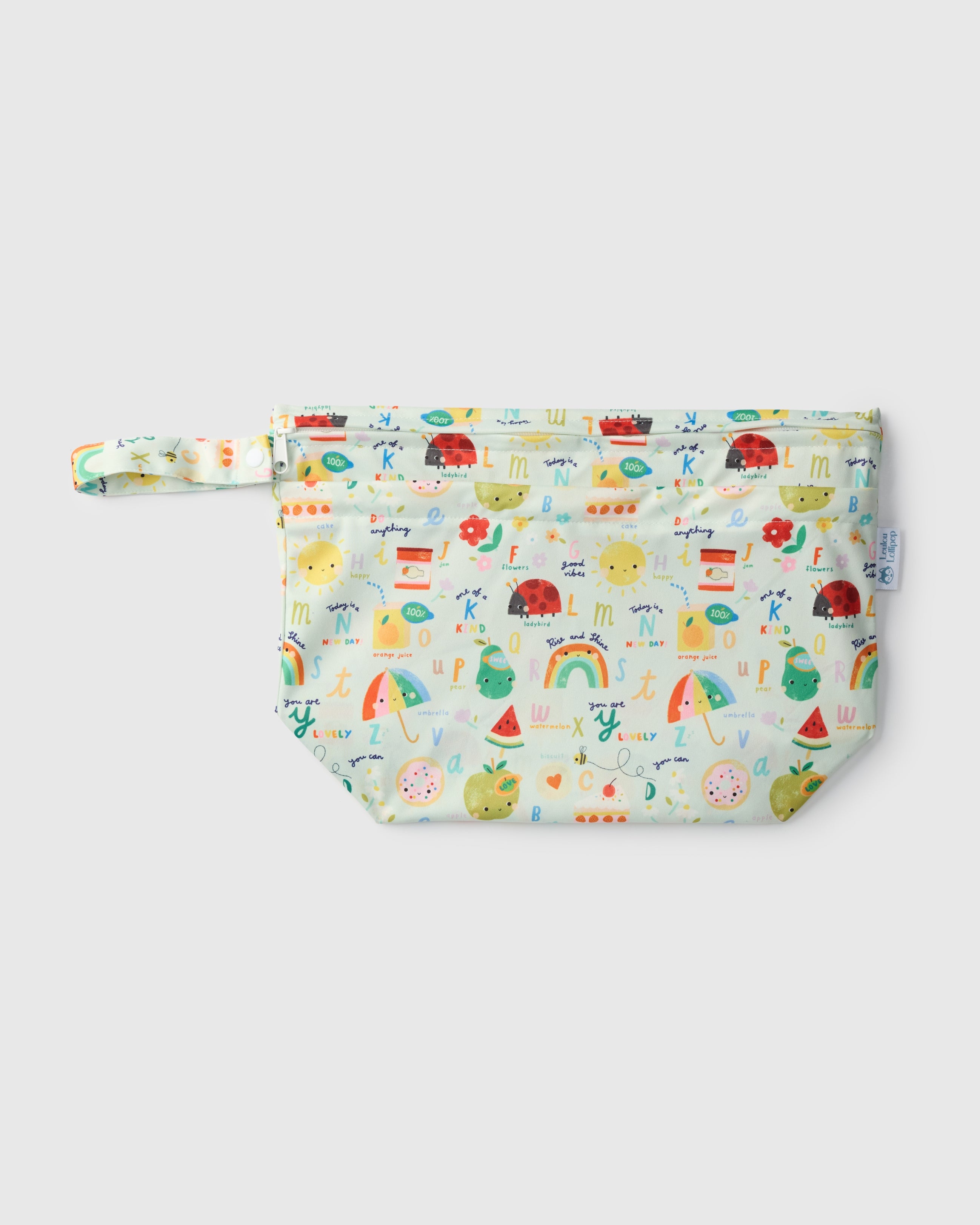 Loulou Lollipop Wet Dry Bag in Alphabet Smiles — front view on white background
