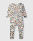Floral patterned onesie sleeper on a white background