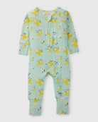 Baby onesie with lemon pattern on a light blue background