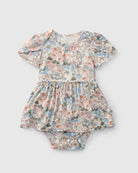Floral baby romper on a light gray background