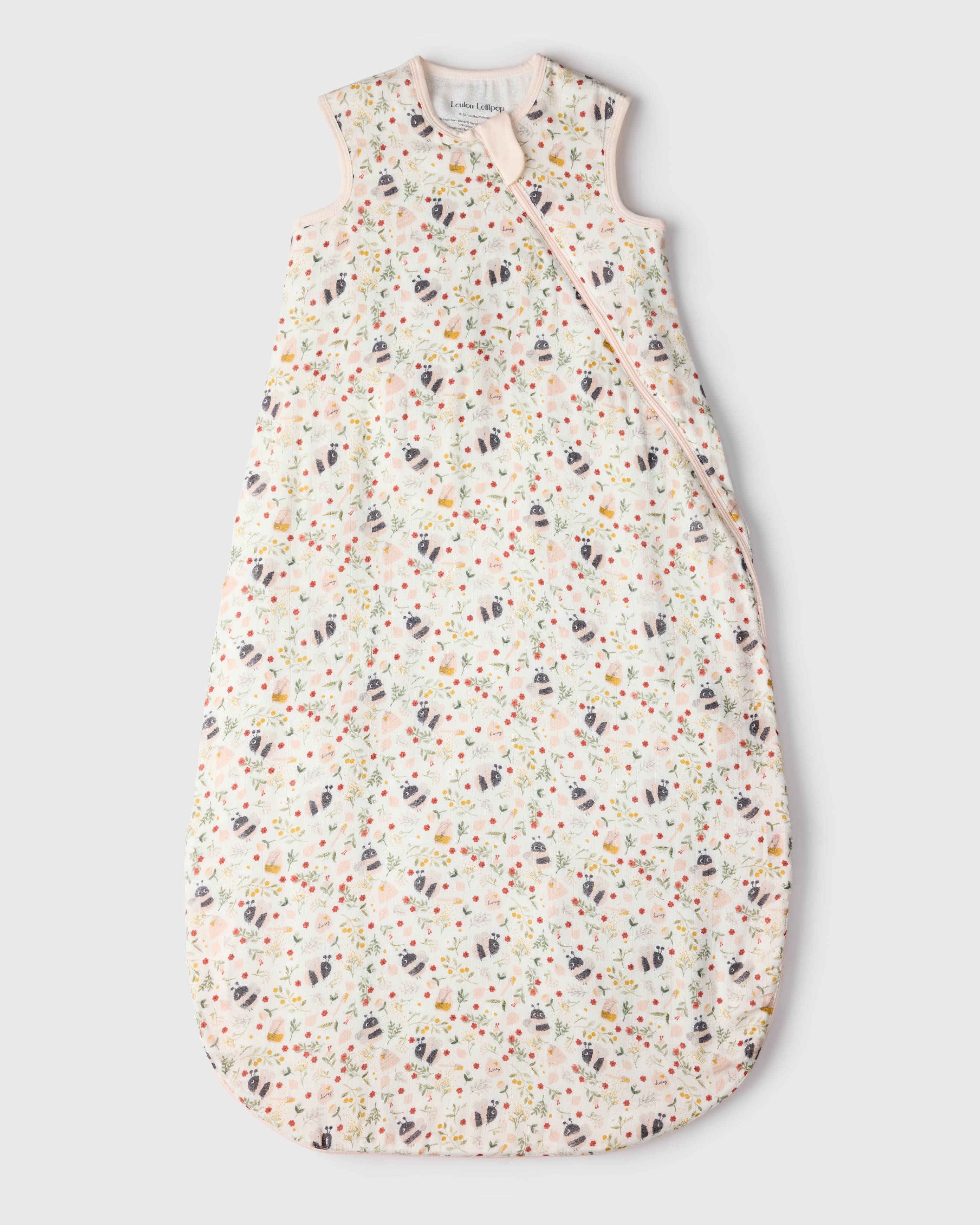 Loulou Lollipop muslin 0.5 TOG lightweight baby sleep bag in Bumble Bees — front view on white background