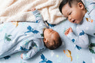 Baby in Sleep Sack with Big Brother in Sleeper in Magical Dragons print.