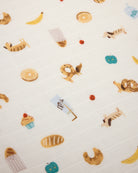 Pattern of various food items on a white background