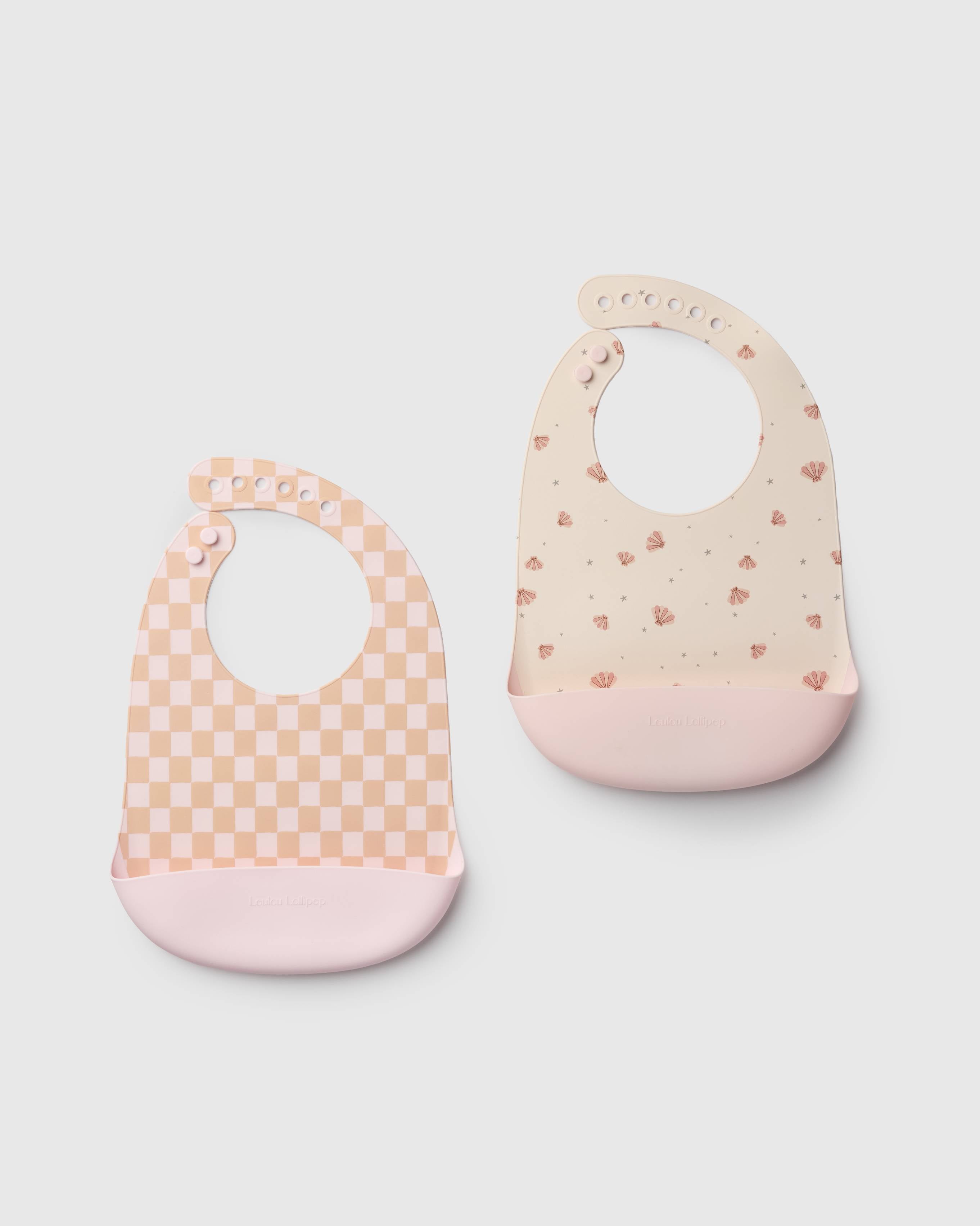 Loulou Lollipop FDA-compliant food-grade silicone baby bib set in Seashell and Pink Checkerboard - front view on white background