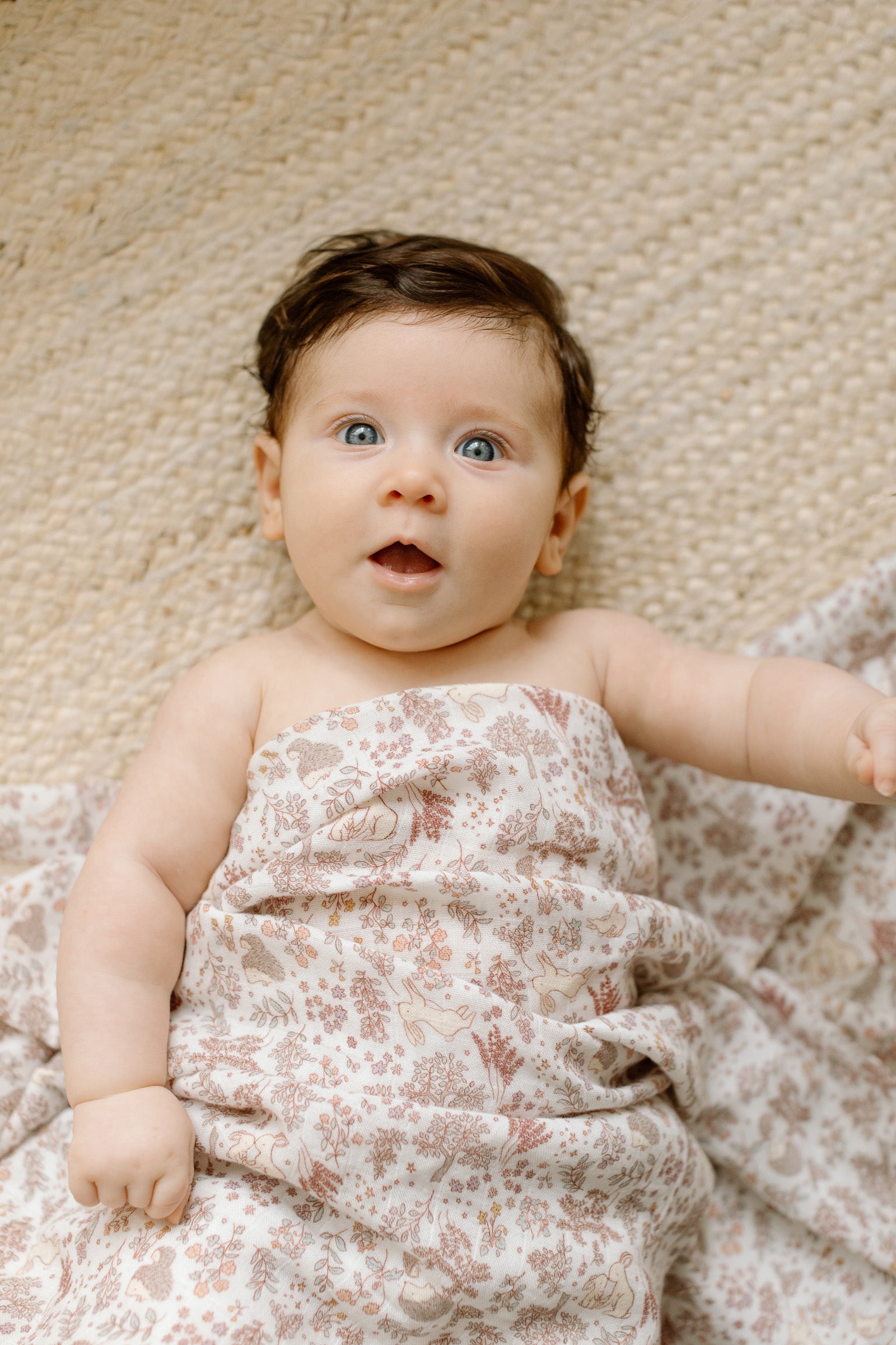 Loulou Lollipop bamboo cotton muslin swaddle blanket in Hedgehog Forest — front view on white background