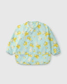 Baby bib with lemon pattern on a light blue background