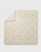 Patterned baby blanket with a white background