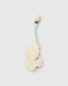Teething ring with silicone beaded chain on a light gray background