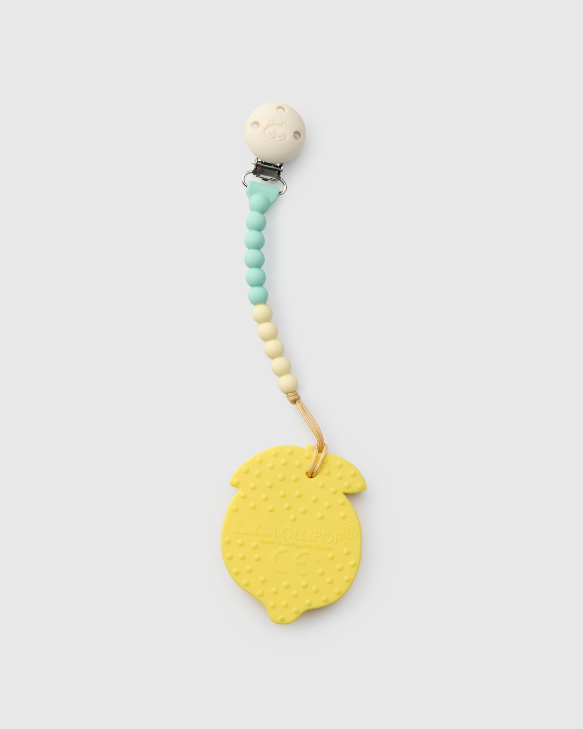 Yellow teething ring with a beaded holder on a white background