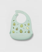 Mint green bib with avocado pattern on a light gray background