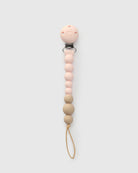 Loulou Lollipop FDA-compliant food-grade silicone pacifier clip in pink quartz - front view on white background