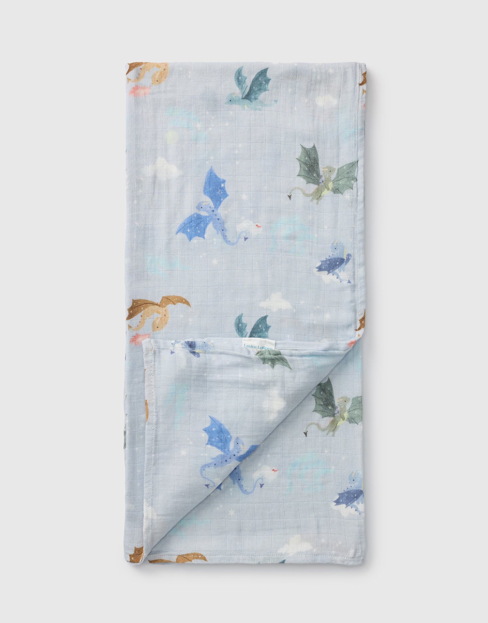 Loulou Lollipop bamboo cotton muslin swaddle blanket in Magical Dragons — front view on white background